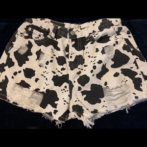 POL distressed denim cow print shorts